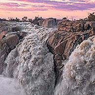 Waterfall on the Orange River in the Augrabies Falls National Park at sunset, Northern Cape Province, South Africa